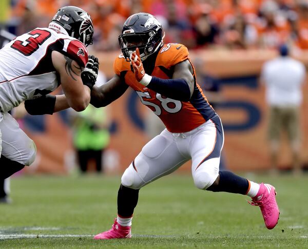 Denver Broncos outside linebacker Von Miller (58) lines up against Atlanta Falcons tackle Ryan Schraeder (73) during the first half of an NFL football game, Sunday, Oct. 9, 2016, in Denver. (AP Photo/Jack Dempsey)