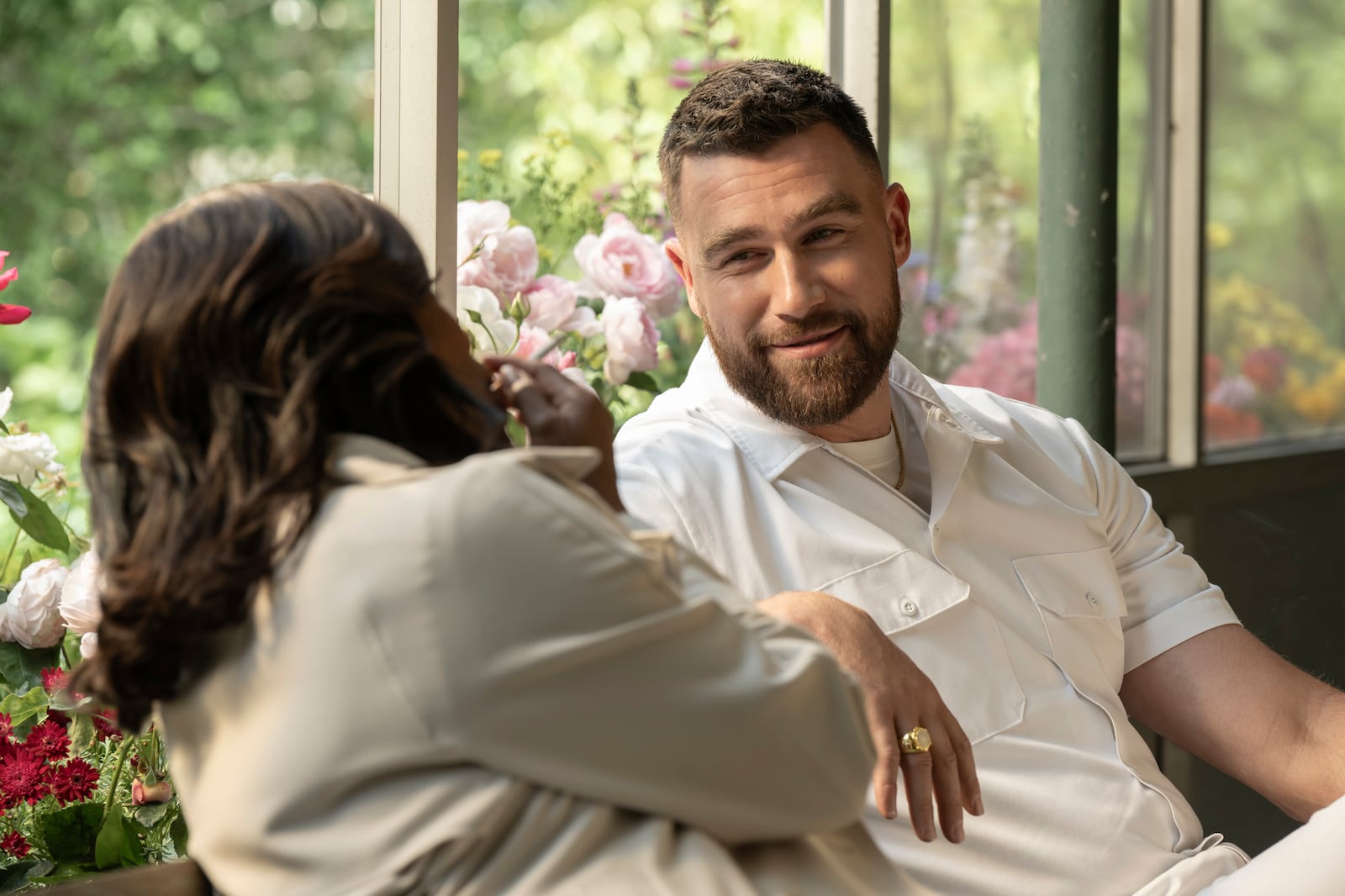 This image released by FX shows Niecy Nash, left, and Travis Kelce in a scene from the series "Grotesquerie." (Prashant Gupta/FX via AP)