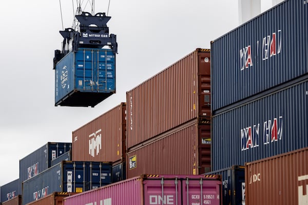 A container is lifted at the Yusen Terminal in the Port of Los Angeles, Tuesday, March 11, 2025, in San Pedro, Calif. (AP Photo/Etienne Laurent)