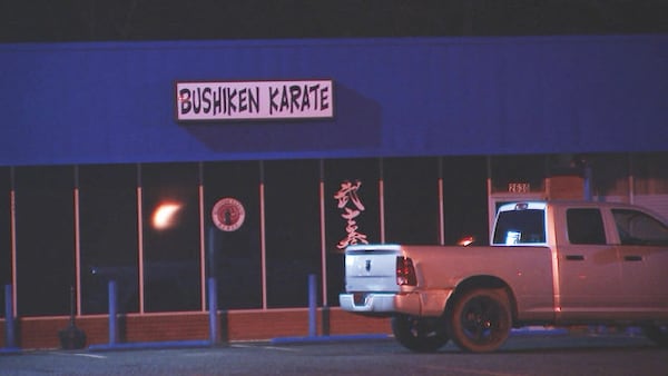 A woman ran into a karate studio in Charlotte, after a man tried to force her into his car.