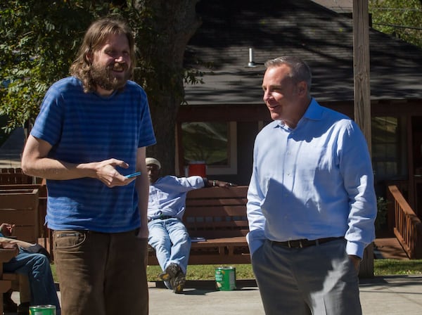 Tyler Bowser (right) talks recently with Jon Hoyta, a resident at the Veterans Empowerment Organization facility in Atlanta. The nonprofit receives no government funding, so it can help veterans quickly. STEVE SCHAEFER / SPECIAL TO THE AJC