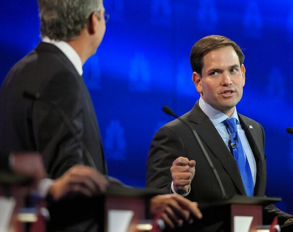 Marco Rubio, right, and Jeb Bush, argue a point during the CNBC Republican presidential debate at the University of Colorado, Wednesday, Oct. 28, 2015, in Boulder, Colo. (AP Photo/Mark J. Terrill)