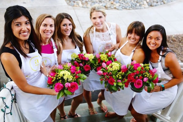 Women attend an event for Alice's Table. The business, supported by Sara Blakely during her guest turn on ABC's Shark Tank, is just entering the Atlanta market.