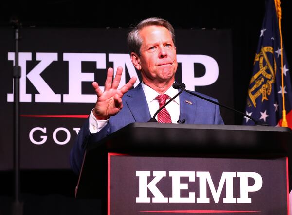 052422 Atlanta: Governor Brian Kemp flashes four more years while delivering his election night party speech at the College Football Hall of Fame on Tuesday, May 24, 2022, in Atlanta.    “Curtis Compton / Curtis.Compton@ajc.com”