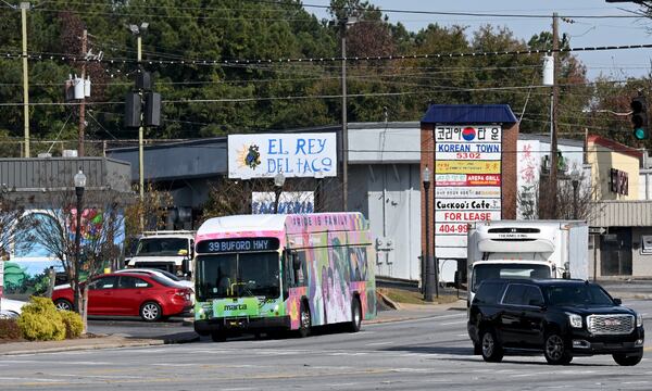 A plaza along Buford Highway in Doraville called Koreatown is shown to have only a couple Korean businesses left on Wednesday, Dec. 4, 2024. Popular Korean Chinese restaurant Yen Jing remains vacant after closing in 2021. (Hyosub Shin/AJC)