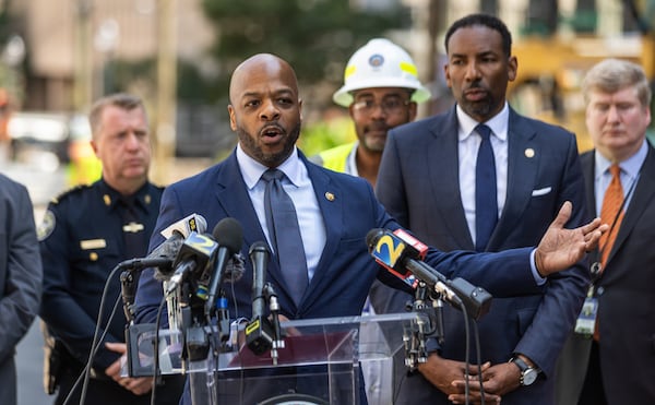 Watershed Commissioner Al Wiggins speaks at a press conference after Atlanta, Mayor Andre Dickens said Monday that he took criticism from the public Òto heart.Ó Crews are continuing to work on a broken main on West Peachtree Street in Midtown, with nearby residents warned of impacts to their water service as the crisis reached its fourth day Monday, June 3, 2024. Water had been gushing out of the broken main until Monday morning, when workers were seen pumping out water. (John Spink/AJC)