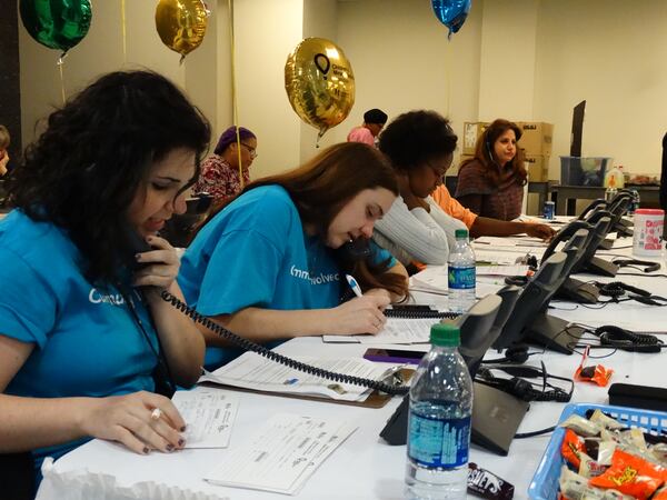 Katie McBain of Smyrna and Heather Sprouse of Douglasville volunteered to man the phone lines for Star 94's careathon. CREDIT: Rodney Ho/rho@ajc.com