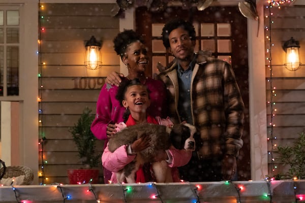 (L-R): Teyonah Parris as Allison, Madison Skye Validum as Charlotte, and Chris 'Ludacris' Bridges as Eddie in DASHING THROUGH THE SNOW, exclusively on Disney+. Photo by Steve Dietl. © 2023 Disney Enterprises, In.c All Rights Reserved.