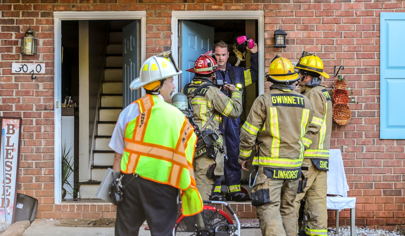 Gwinnett County firefighters responded to an apartment building on Spruce Circle after a neighbor reported seeing smoke coming out of one of the unit's windows and roof Thursday morning. No injuries were reported.
