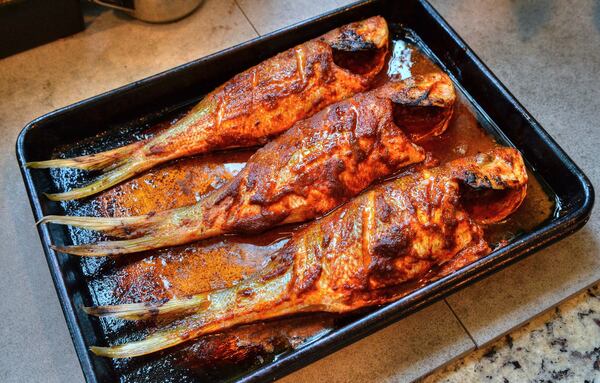 During Asha Gomez’s recent trip to her native Kerala, India, she watched the fishing boats leave early, then come back with their haul later in the day. Here is Gomez’s Spice-rubbed Roasted Snapper. STYLING BY ASHA GOMEZ / CONTRIBUTED BY CHRIS HUNT