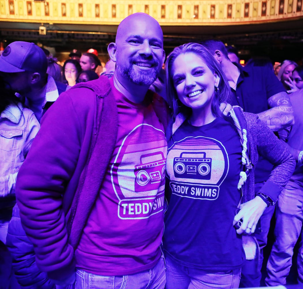 -- A couple show their support for Teddy Swims
Teddy Swims rocked the sold out Tabernacle on Friday, December 20, 2024, for his 11th Annual Kegsmas celebration, with Cody Matlock opening. Recently nominated for a Best New Artist Grammy, Swims supports sponsor Atlanta Community Food Bank with food donations from his fans.
Robb Cohen for the Atlanta Journal-Constitution