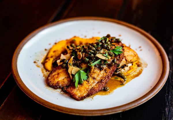 Flounder a la Meuniere with roasted winter squash, coal roasted cabbage, brown butter, capers and parsley. CONTRIBUTED BY HENRI HOLLIS