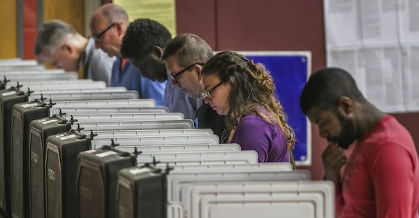 Voters voted in the primary election at Henry W. Grady High School in Atlanta on May 22, 2018. JOHN SPINK/JSPINK@AJC.COM