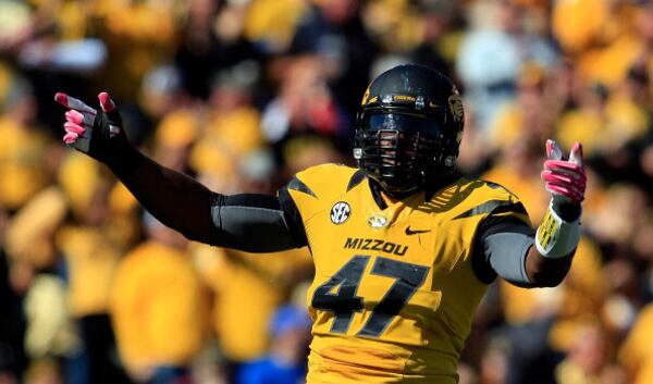 COLUMBIA, MO - OCTOBER 19: Defensive lineman Kony Ealy #47 of the Missouri Tigers reacts after a sack of quarterback Tyler Murphy #3 of the Florida Gator sduring the game at Faurot Field/Memorial Stadium on October 19, 2013 in Columbia, Missouri. (Photo by Jamie Squire/Getty Images) Defensive lineman Kony Ealy #47 of the Missouri Tigers reacts after a sack of quarterback Tyler Murphy #3 of the Florida Gator sduring the game at Faurot Field/Memorial Stadium on October 19, 2013 in Columbia, Missouri. (Photo by Jamie Squire/Getty Images)