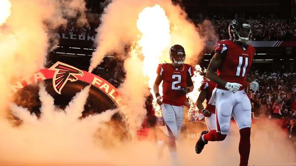 Atlanta Falcons Matt Ryan and Julio Jones enter the field. 