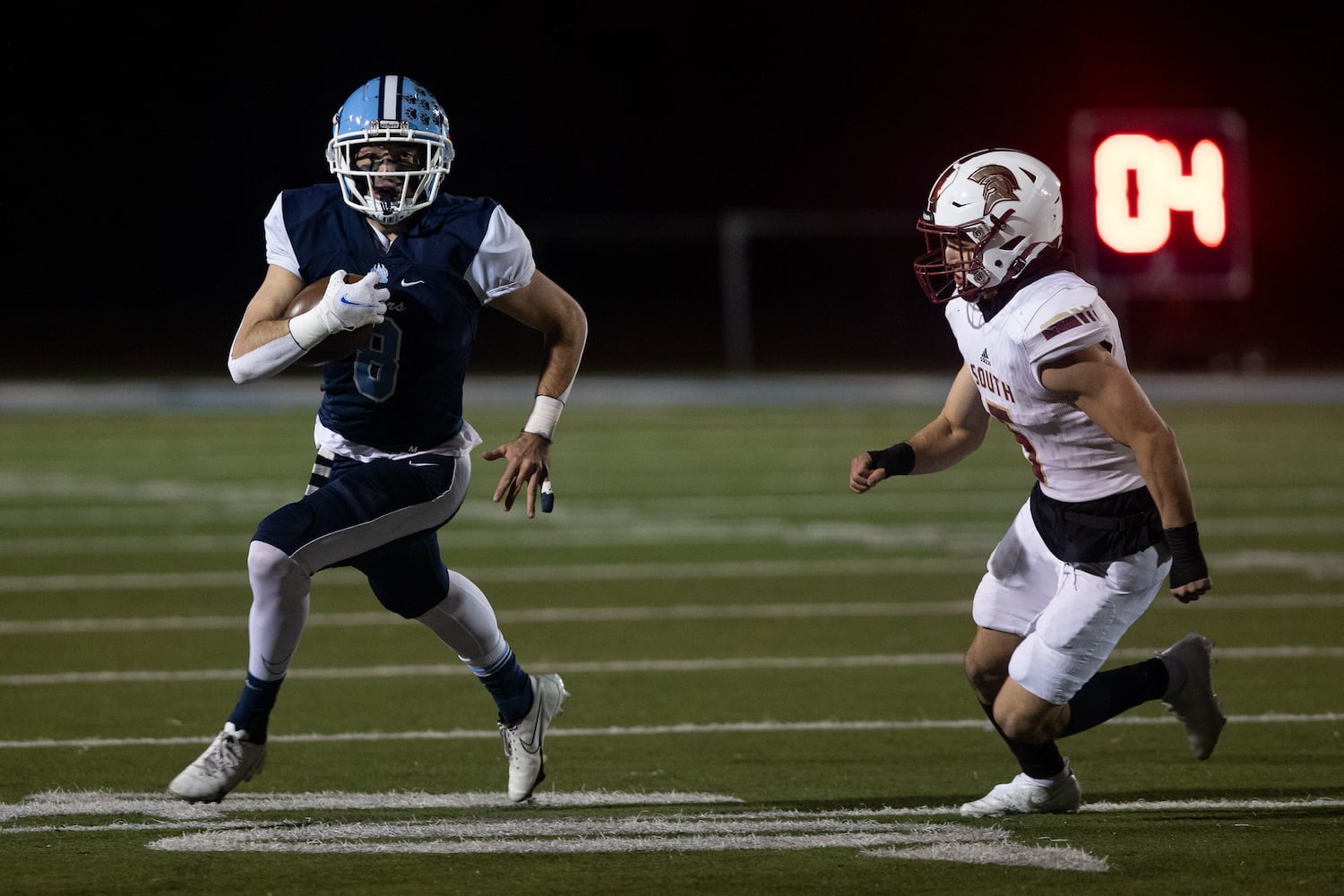 Cambridge's Jack Marlow carries the ball during a GHSA high school football game between Cambridge and South Paulding at Cambridge High School in Milton, GA., on Saturday, November 13, 2021. (Photo/Jenn Finch)