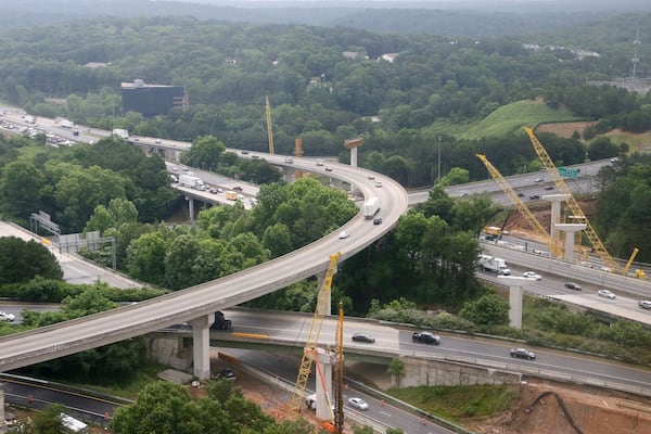 Express lane construction is underway at the I-285 and I-75 interchange in this May 2015 photo. View showing the I-285 (running top left to bottom right) and I-75 interchange near the Sun Trust Park construction site. BOB ANDRES / BANDRES@AJC.COM