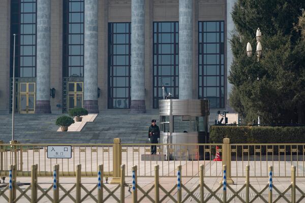 A Chinese soldier guards the Great Hall of the People ahead of the National People's Congress in Beijing, on Feb. 28, 2025. (AP Photo/Ng Han Guan)