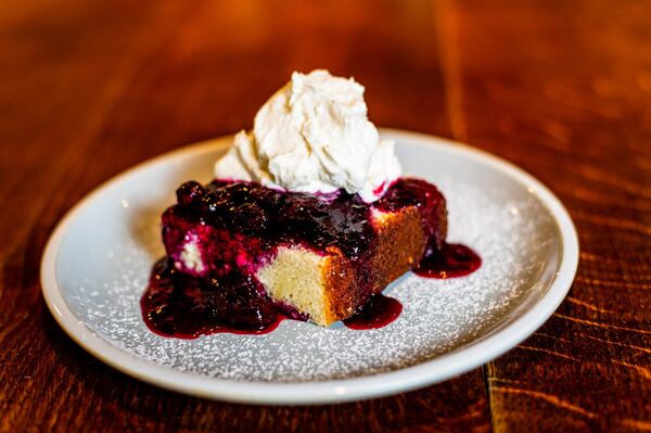 Lemon Goat Cheese Pound Cake with blueberry brandy compote is the best way to “finish strong” at 7 Acre BarNgrill. CONTRIBUTED BY HENRI HOLLIS