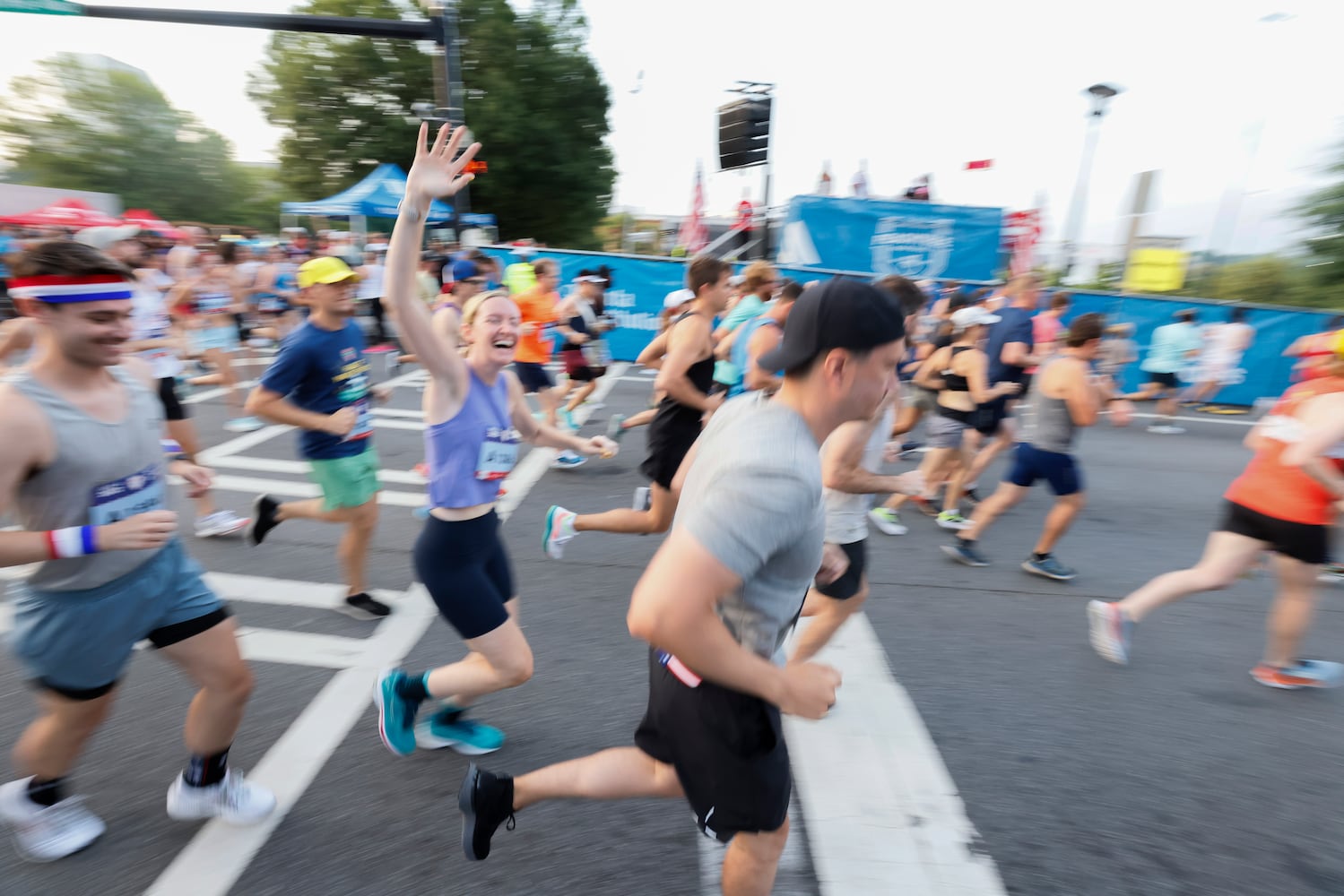 Runners at the start of the 53rd running of the Atlanta Journal-Constitution Peachtree Road Race in Atlanta on Sunday, July 3, 2022. (Miguel Martinez / Miguel.Martinezjimenez@ajc.com)