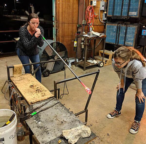 Ornaments and glass flowers are frequently the first objects made by students at Decatur Glassblowing.