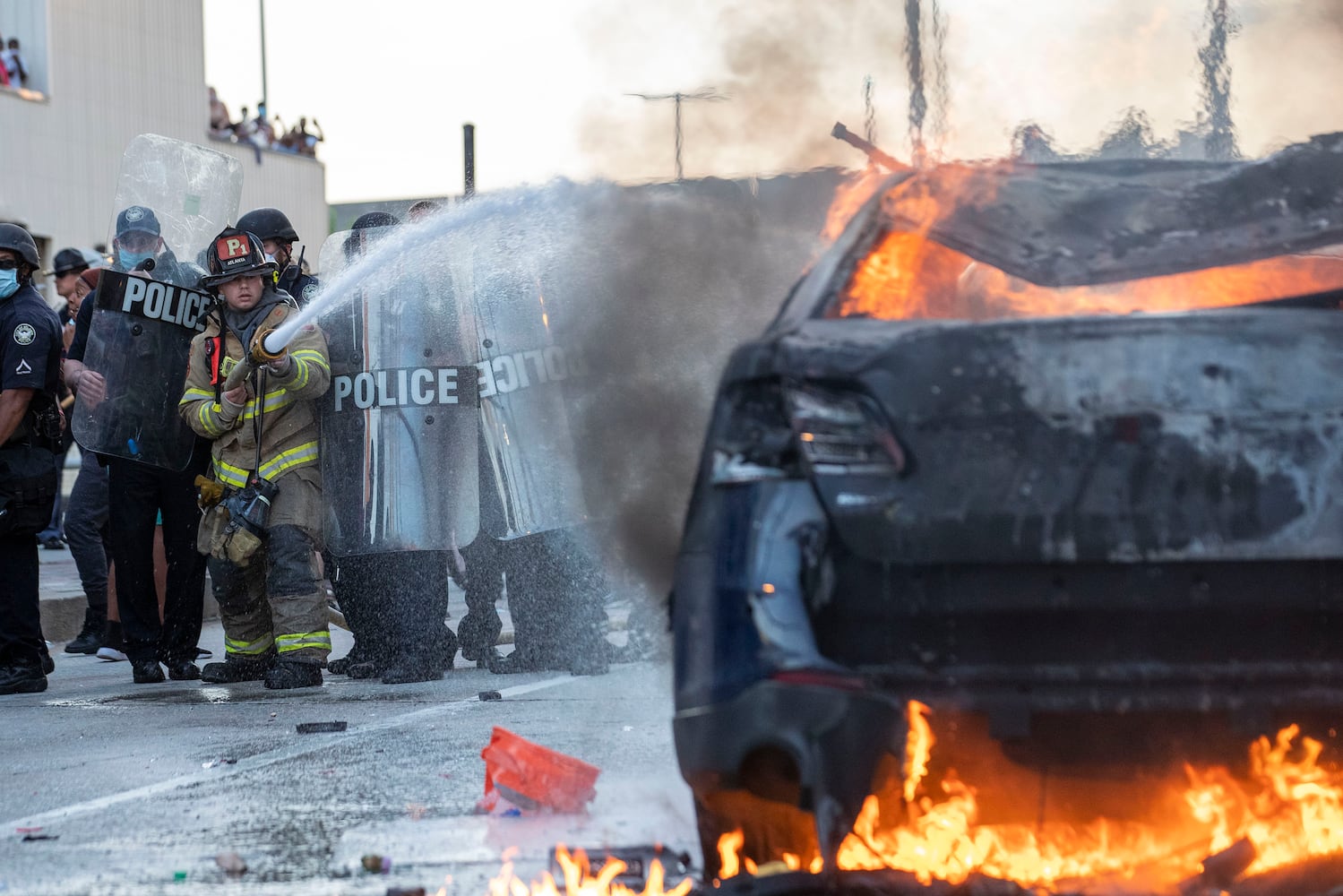 PHOTOS: Atlanta rally against police violence draws hundreds, turns violent