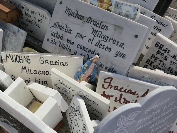 Cubans who visit La Milagrosa, the grave of an unofficial saint in Cementerio de Colón, leave behind tokens of appreciation for answered prayers. CONTRIBUTED BY WESLEY K.H. TEO