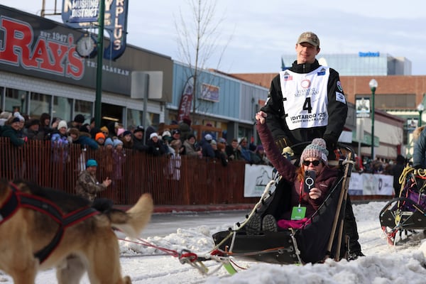 FILE - Matt Hall (4), of Two Rivers, Alaska, mushes down Fourth Street during the Ceremonial Start of the Iditarod Trail Sled Dog Race in Anchorage, Alaska., Saturday, March 1, 2025. (AP Photo/Amanda Loman, File)