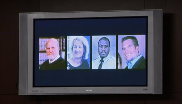 The four victims are shown on a courtroom monitor in mid-December 2008. Nichols had earlier admitted killing Superior Court Judge Rowland Barnes, who was overseeing his rape trial, Barnes' court reporter, Julie Ann Brandau, and Sheriff's Deputy Sgt. Hoyt Teasley, who pursued Nichols, on March 11, 2005. David Wilhelm, an off-duty federal agent, was gunned down during a robbery that night.