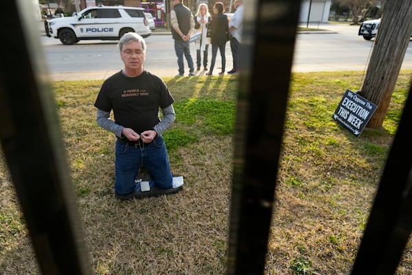 Bill Scicchitano prays outside the execution of South Carolina inmate Brad Sigmon, Friday, March 7, 2025, in Columbia, S.C. (AP Photo/Chris Carlson)