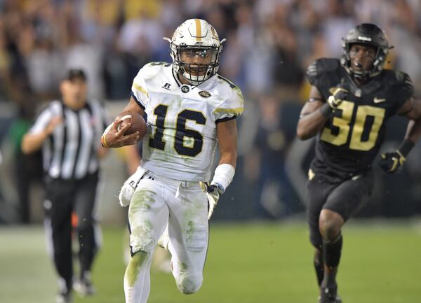 October 21, 2017 Atlanta - Georgia Tech quarterback TaQuon Marshall (16) runs for a touchdown in the second half of an NCAA college football game at Bobby Dodd Stadium on Saturday, October 21, 2017. Georgia Tech beat Wake Forest 38-24. HYOSUB SHIN / HSHIN@AJC.COM