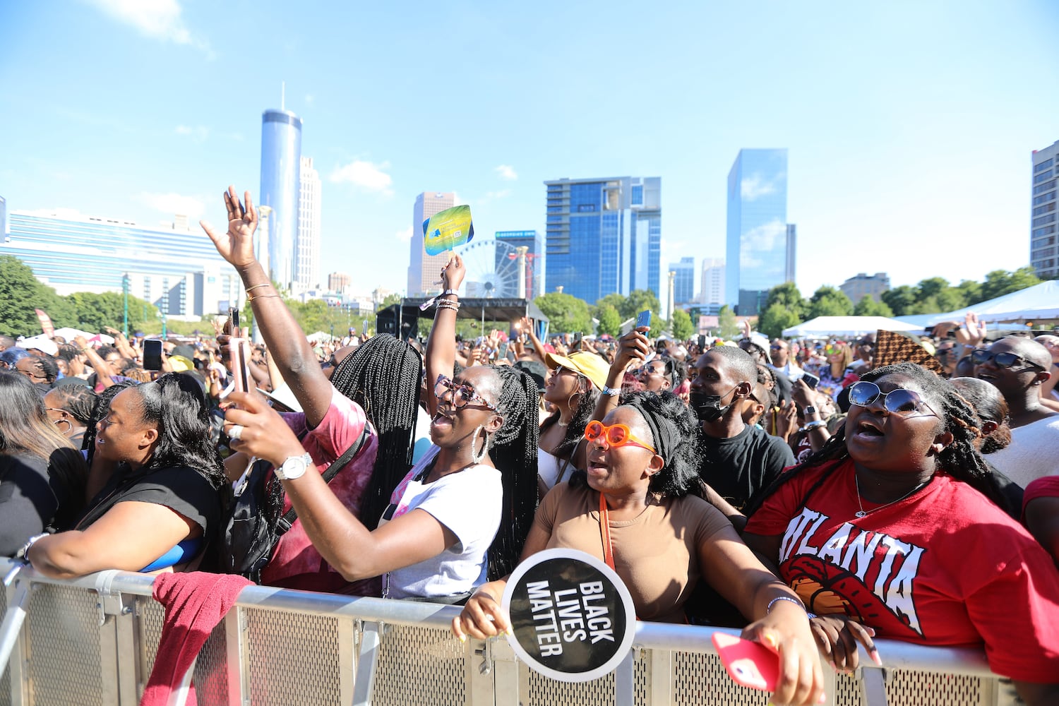 Concert-goers sing along with Kirk Franklin, who was performing at the Sound Stage during the ONE Musicfest on Sunday, October 10, 2021. Miguel Martinez for The Atlanta Journal-Constitution