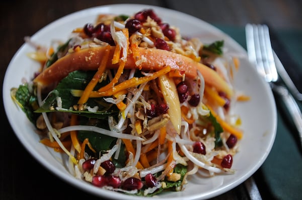 Butternut squash salad with papaya, pomegranate, herbs, peanuts, dried shrimp and maple nuoc mam at Ticonderoga Club. / (beckystein.com)