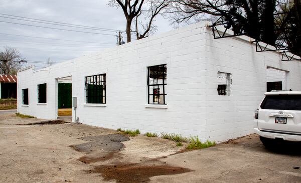 The exterior of the open-air patio at The Junction, which Cafexito uses for outdoor seating. Kemery cleaned up and repainted the building. STEVE SCHAEFER FOR THE ATLANTA JOURNAL-CONSTITUTION