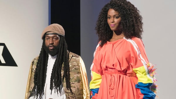  Kudzanai Karidza, nursing a killer cold and looking sick, next to his model and the dress that knocked him out of the competition. CREDIT: Lifetime