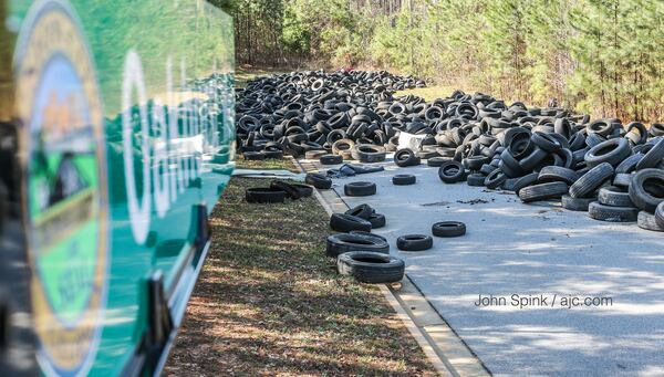 Several warrants have been issued for the arrest of Donald Leverette. Union City police say he dumped more than 1,000 tires behind one subdivision. JOHN SPINK / JSPINK@AJC.COM