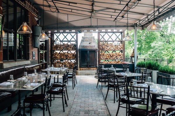 The patio at Marcel has a fireplace. / Photo by Jeremiah Cowan