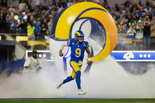 FILE - Los Angeles Rams quarterback Matthew Stafford (9) runs onto the field before an NFL football game against Philadelphia Eagles, Sunday, Nov. 24, 2024, in Inglewood, Calif. (AP Photo/Kyusung Gong, File)