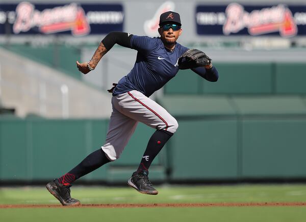 Third baseman Johan Camargo prepares to field a grounder during spring training work February 2020 in North Port, Fla. (Curtis Compton ccompton@ajc.com)