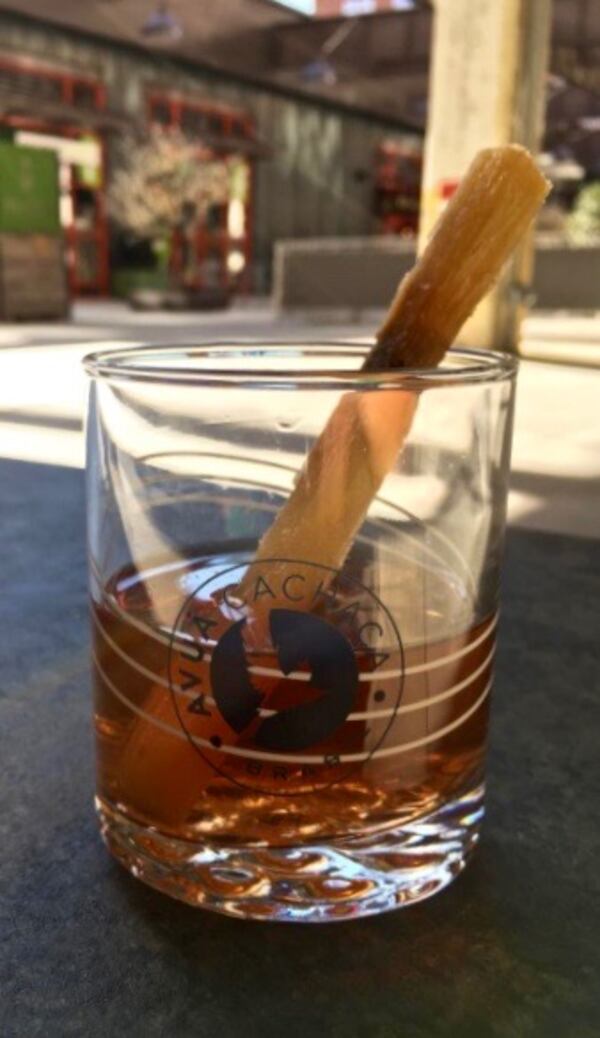 Chá de Cana (cane tea) at El Super Pan with cachaça and Laphroaig scotch. Photo courtesy of El Super Pan