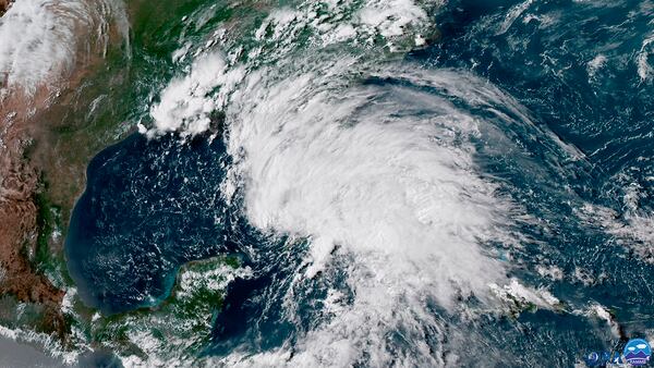 This GOES-16 GeoColor satellite image taken Saturday, May 26, 2018, at 21:30 UTC, and provided by the National Oceanic and Atmospheric Administration (NOAA), shows Subtropical Storm Alberto in the the Gulf of Mexico. The slow-moving system is expected to cause wet misery across the eastern U.S. Gulf Coast over the holiday weekend. (NOAA via AP)