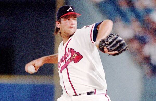 Mark Wohlers fires a pitch. AJC file photo.