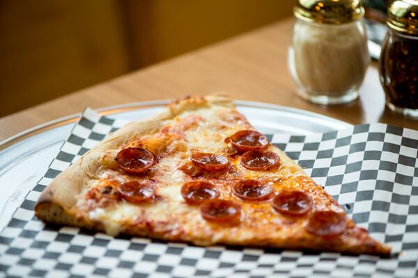 Junior's Pizza slice with pepperoni. Photo credit- Mia Yakel.