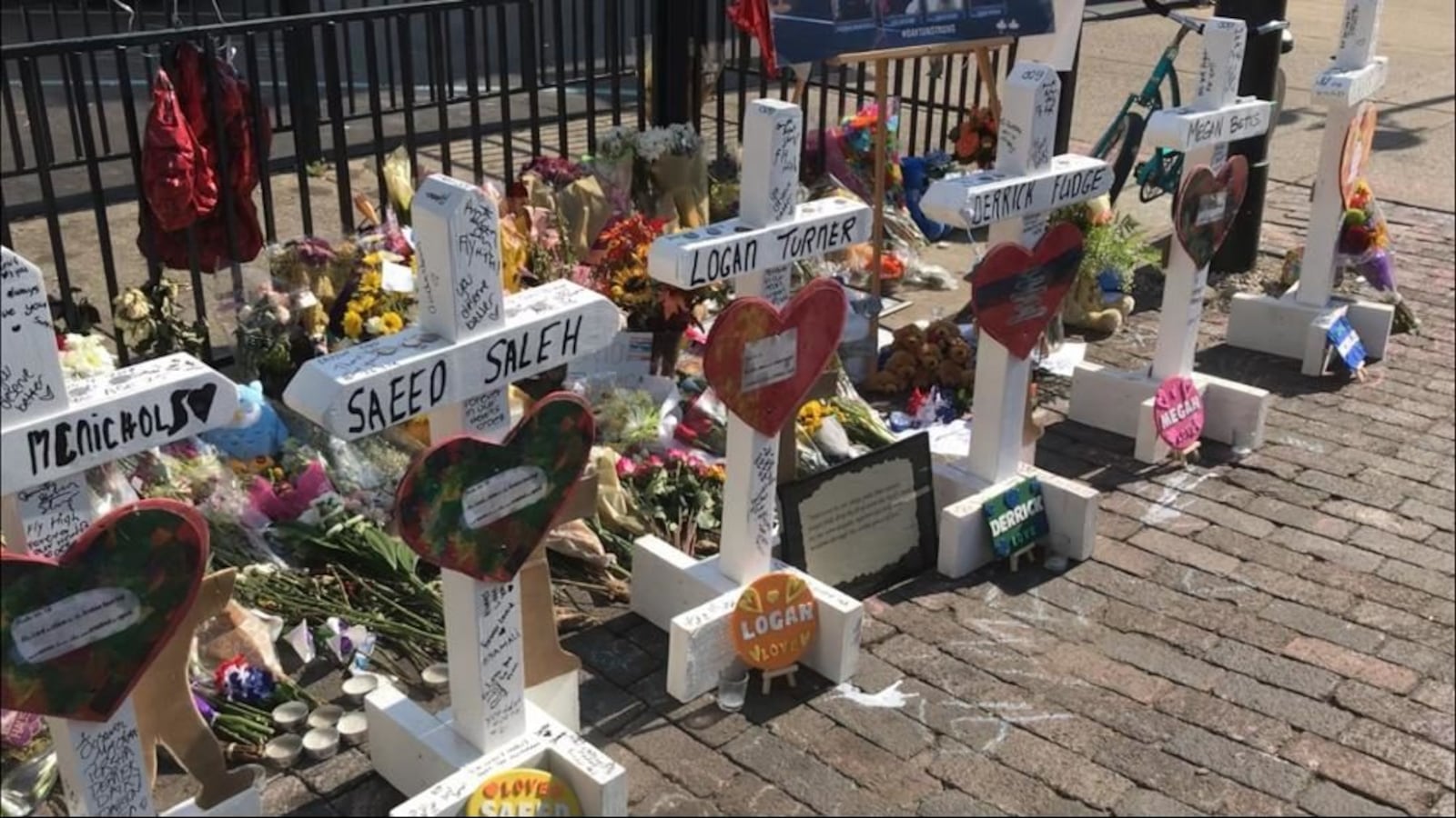 Crosses line the street in Dayton, Ohio, in remembrance of the nine people killed in a mass shooting on Sunday, Aug. 4, 2019.