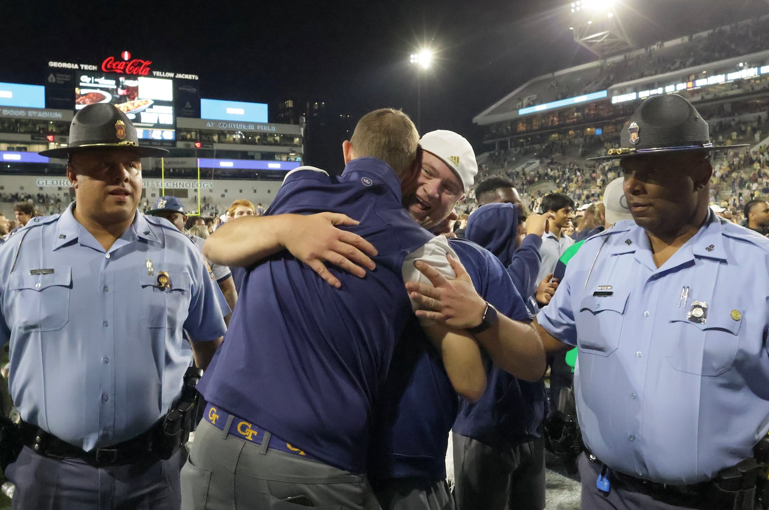 Georgia Tech Yellow Jackets head coach Brent Key is congratulated as he leaves the field.  (Bob Andres for the Atlanta Journal Constitution)