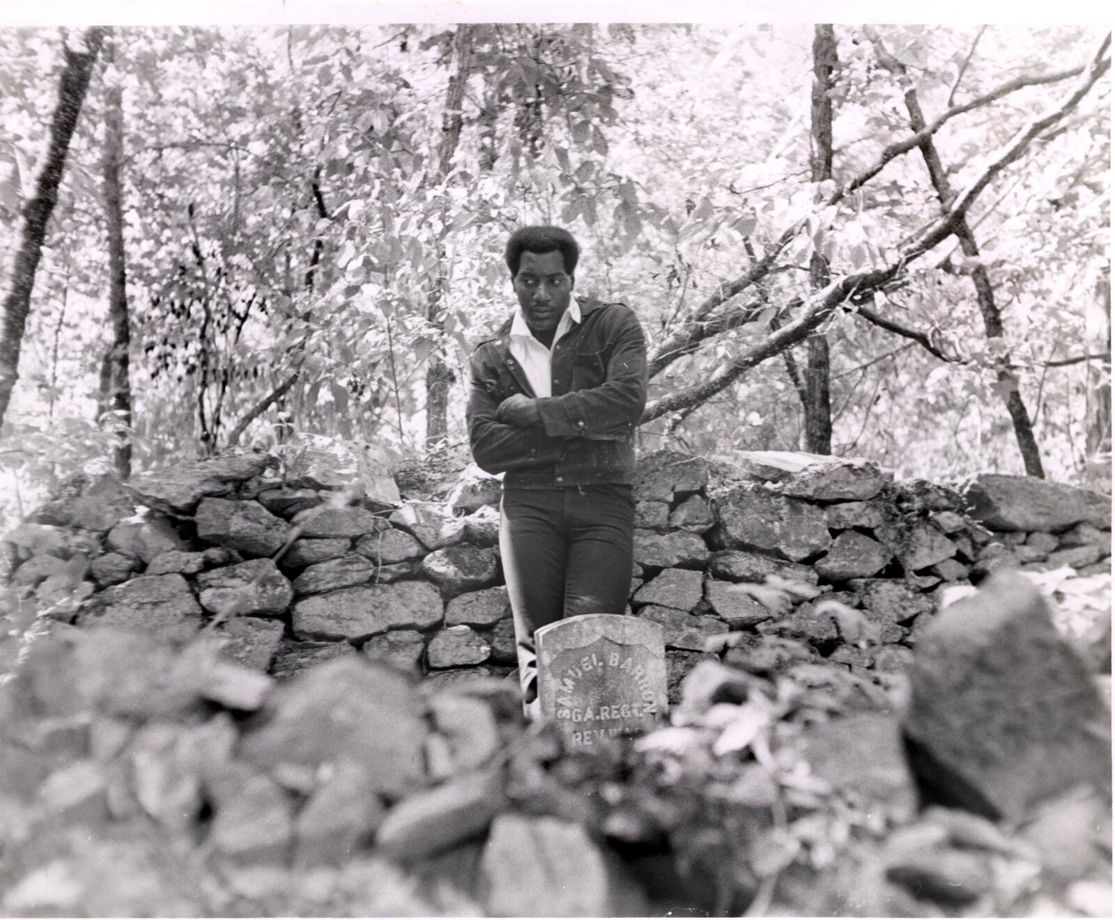 Otis Redding leans on a wall at Big O Ranch. Courtesy of Zelma Redding and Stax Museum of American Soul Music