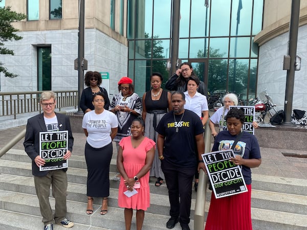 A group of voting and civil rights organizations gathered outside city hall demanding Atlanta leaders put the referendum on the ballot or begin verifying the collected signatures.