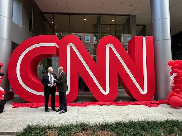 On Sept. 24, 2024, CNN CEO Mark Thompson meets with former CNN president Tom Johnson at the Midtown Turner campus in Atlanta for the unveiling of the CNN logo previously at CNN Center for more than 25 years. CONTRIBUTED