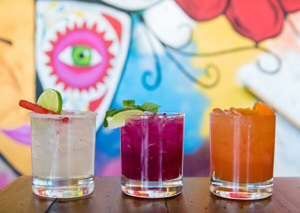 Cocktails at Taco Cantina (from left): Cantina Margarita, Pantera Rosa and La Princesa. CONTRIBUTED BY HENRI HOLLIS