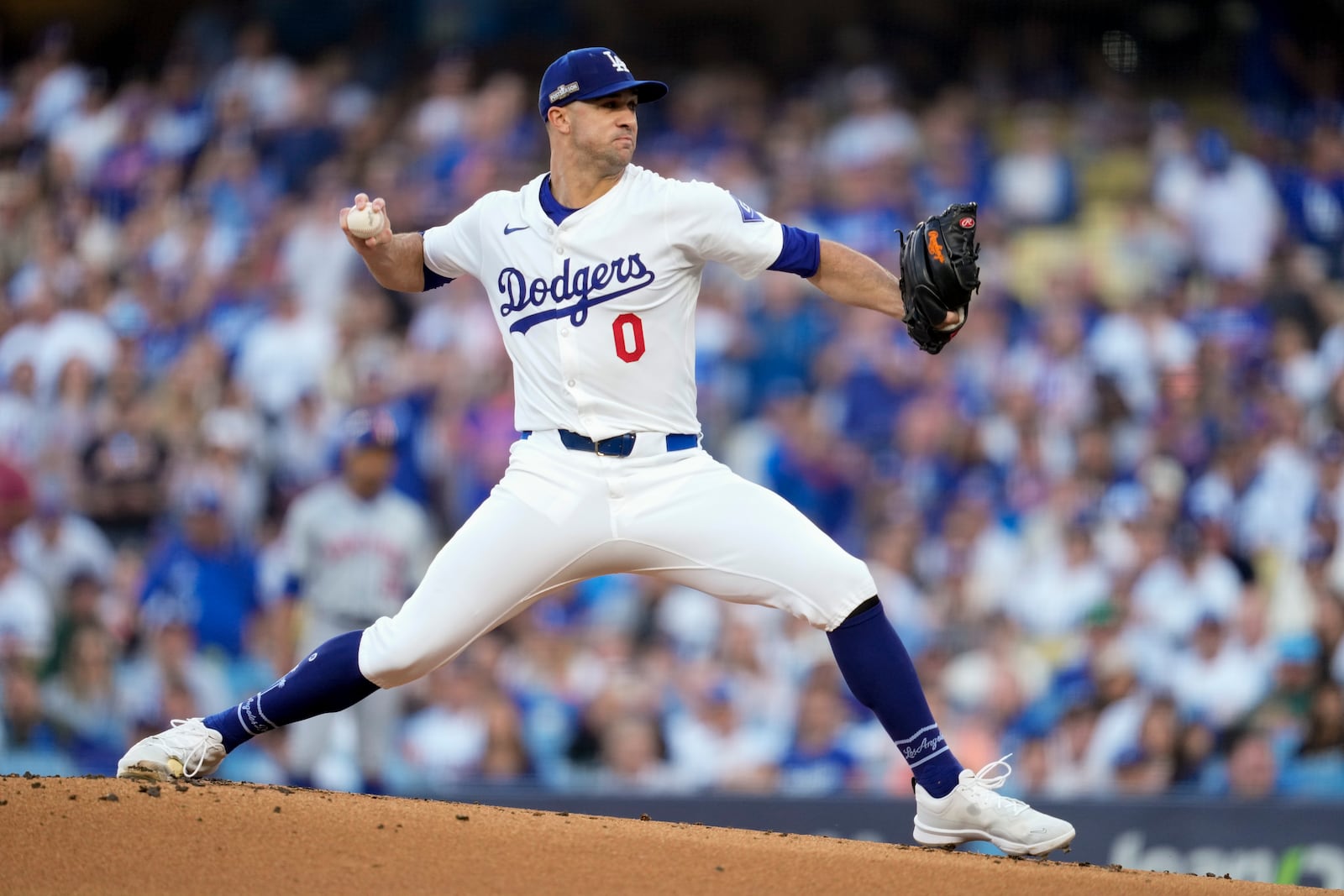 Los Angeles Dodgers pitcher Jack Flaherty throws against the New York Mets during the first inning in Game 1 of a baseball NL Championship Series, Sunday, Oct. 13, 2024, in Los Angeles. (AP Photo/Ashley Landis)